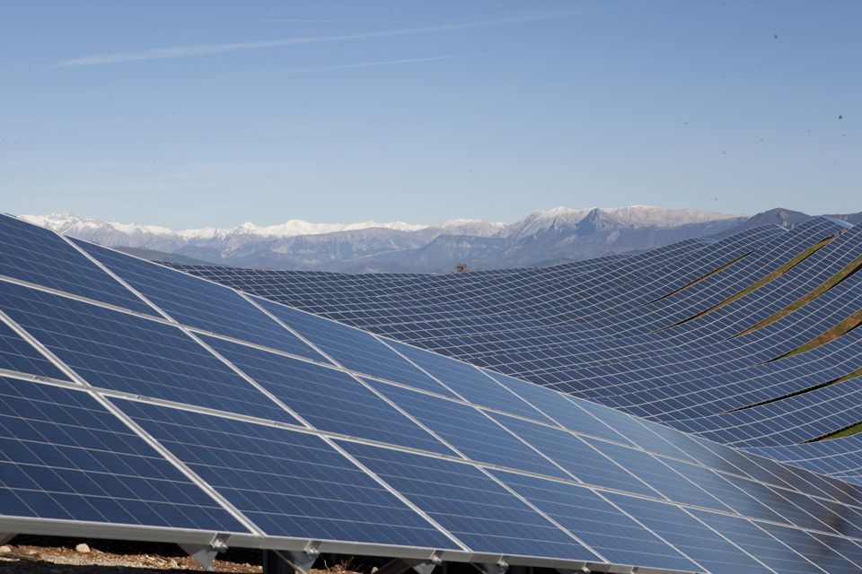 Wind turbines in field